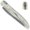 Couteau Prestige Laguiole en Aubrac 1 Pièce 12 cm Plein Manche en Croute d'ivoire de Mammouth Craquelé Ressort Guilloché Mouche Forgée Prestige Stylisée Lame Damas Explosion