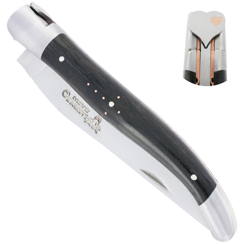 Laguiole folding knife in Aubrac heart 1 piece 12cm copper ebony handle 2 satin stainless steel bolsters single guilloché plates copper fly heart blade brushed stainless steel