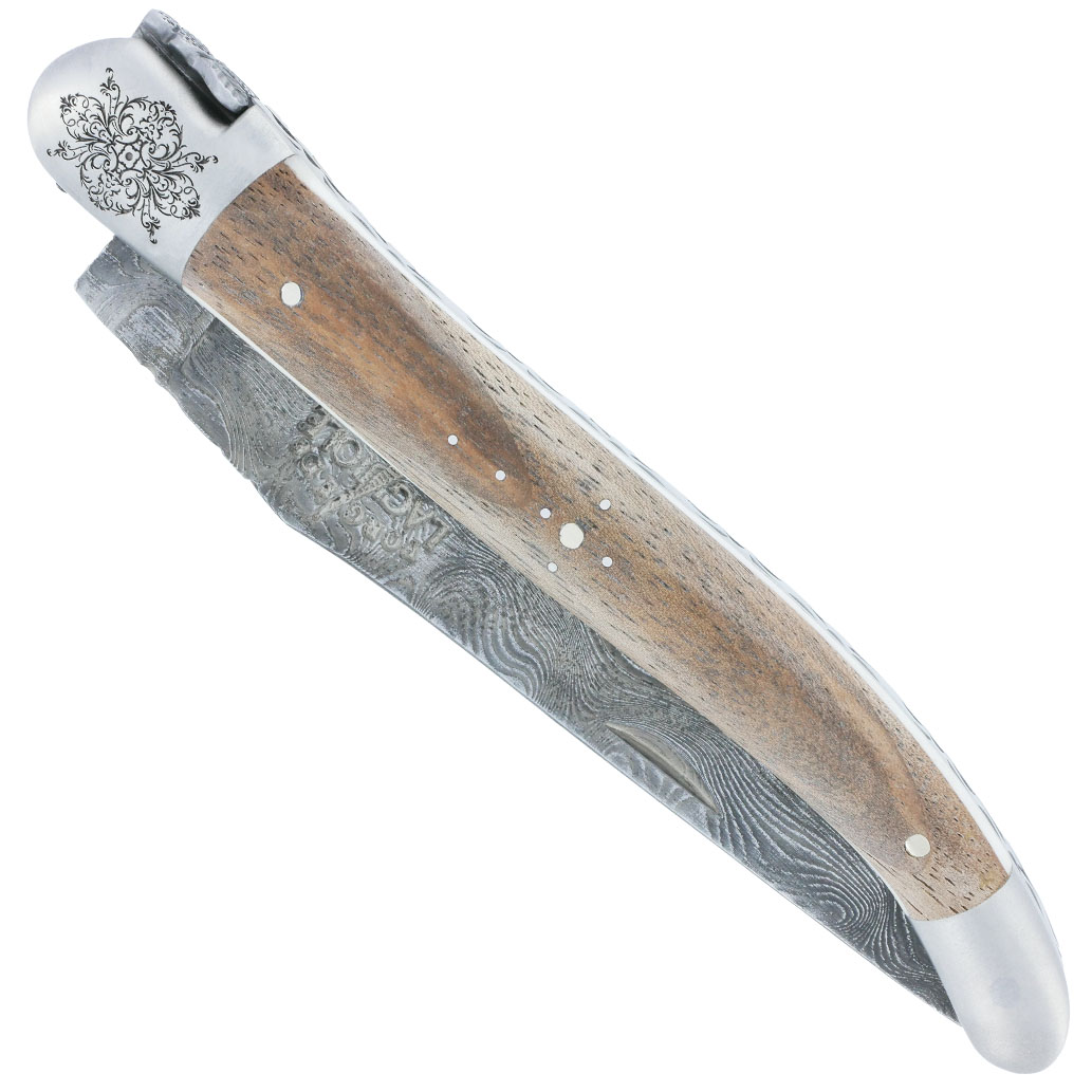 Couteau Prestige Forge de Laguiole 12cm en Noyer Satiné Entretoise en Os Mitre avant gravée Lame Damas Carbone Léopard