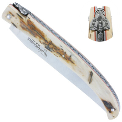 Couteau Laguiole en Aubrac Grande Taille Prestige 1 Pièce 14 cm Plein Manche en Croute d'Ivoire de Mammouth Mouche Forgée stylisée Ressort guilloché à la main Entretoise rouge Pièce Unique